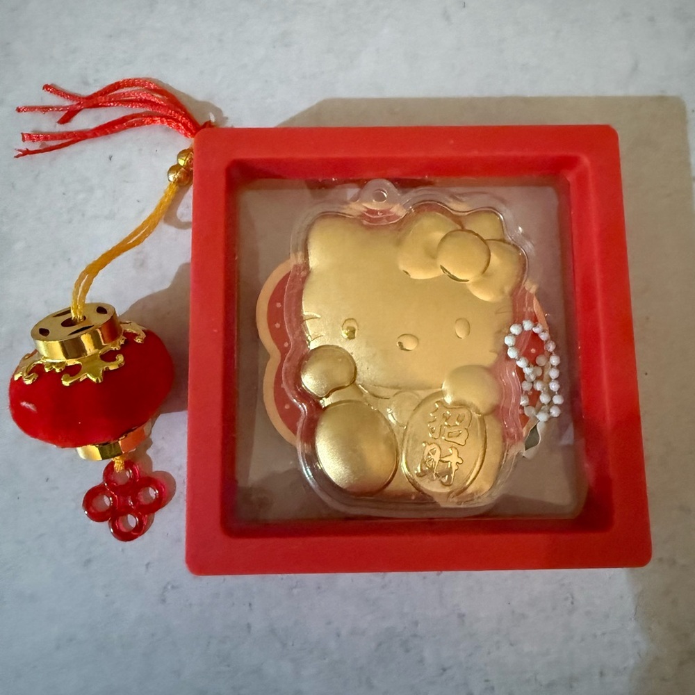 Sanrio Hello Kitty Gold Lucky Charm Ornament - Red